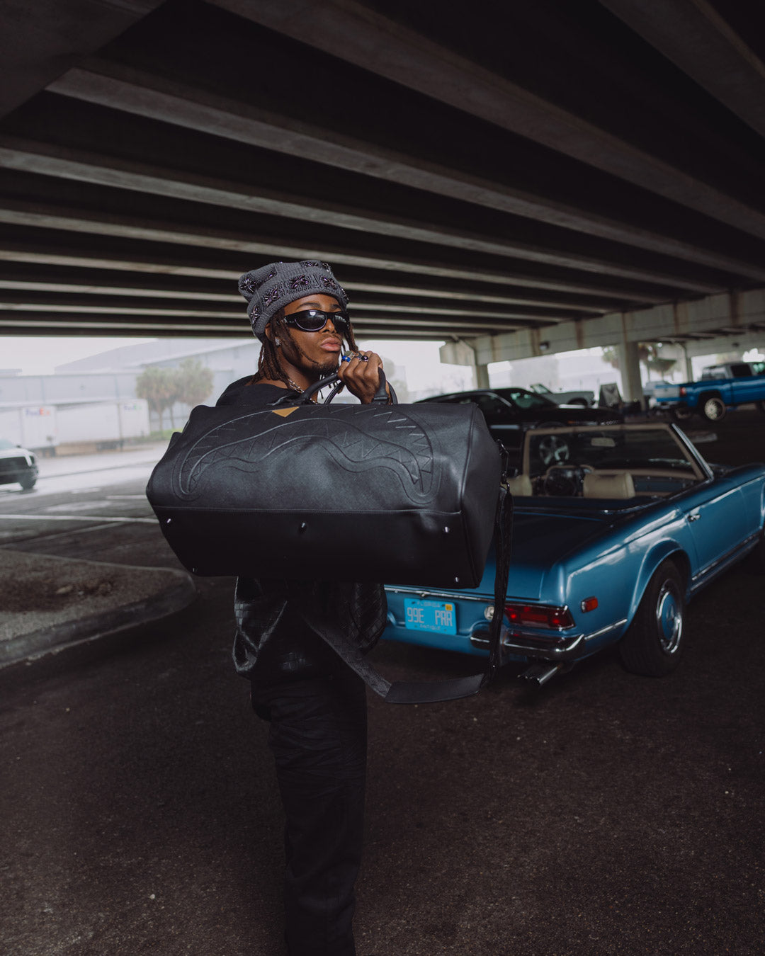 SPRAYGROUND® DUFFLE THE GOLDEN FANG SHARK DUFFLE