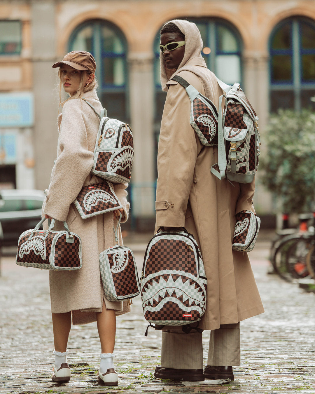 SPRAYGROUND® POUCHETTE CREAM AND BROWN TEAR CHECK CROSSOVER CLUTCH