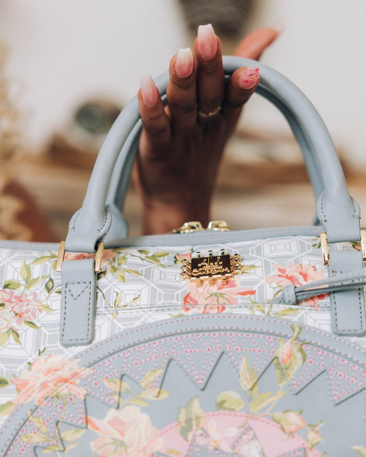 SPRAYGROUND® DUFFLE A.I. AFRICAN INTELLIGENCE ELEGANT ENERGY MINI DUFFLE - SANDFLOWER COLLAB