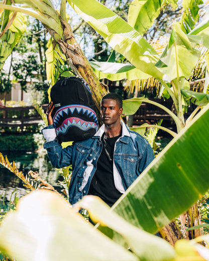 SPRAYGROUND® BACKPACK A.I. AFRICAN INTELLIGENCE BORN AND RAISED BACKPACK - SANDFLOWER COLLAB