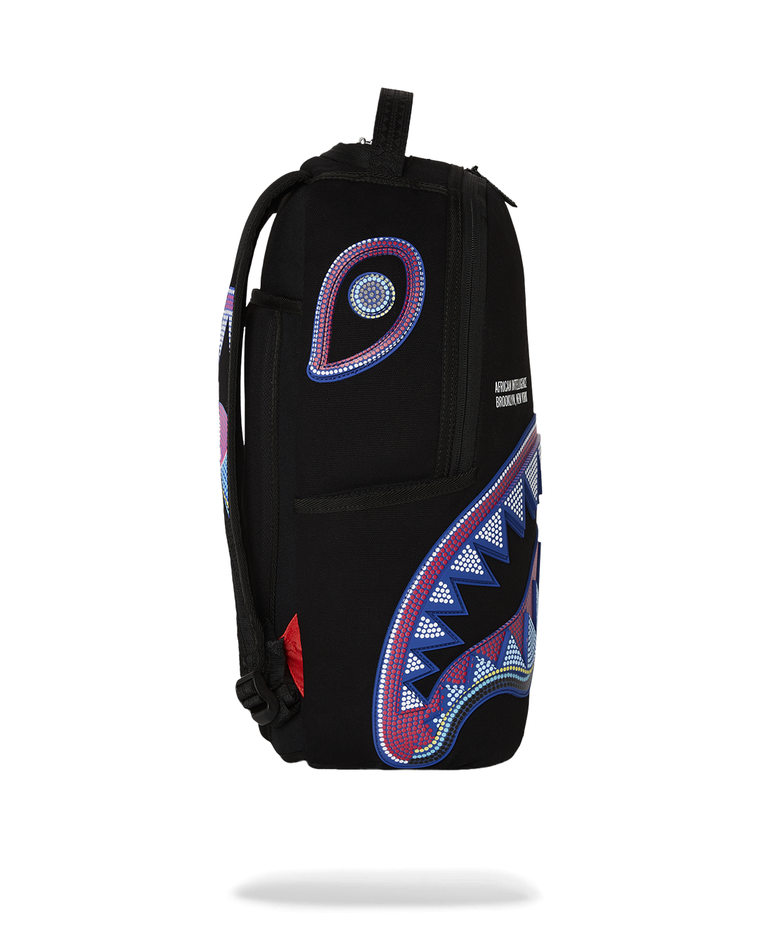 SPRAYGROUND® BACKPACK A.I. AFRICAN INTELLIGENCE BORN AND RAISED BACKPACK - SANDFLOWER COLLAB