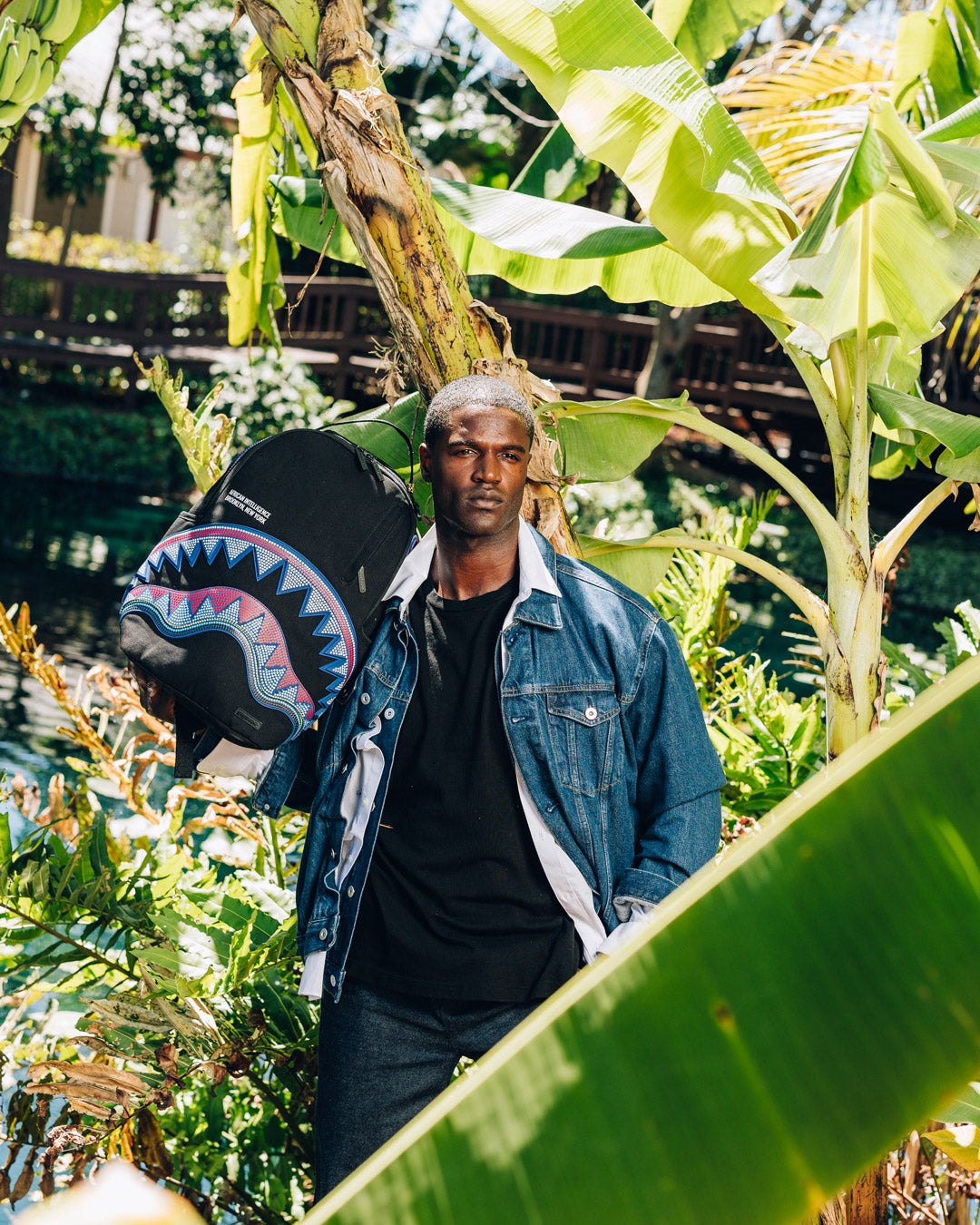 SPRAYGROUND® BACKPACK A.I. AFRICAN INTELLIGENCE BORN AND RAISED BACKPACK - SANDFLOWER COLLAB